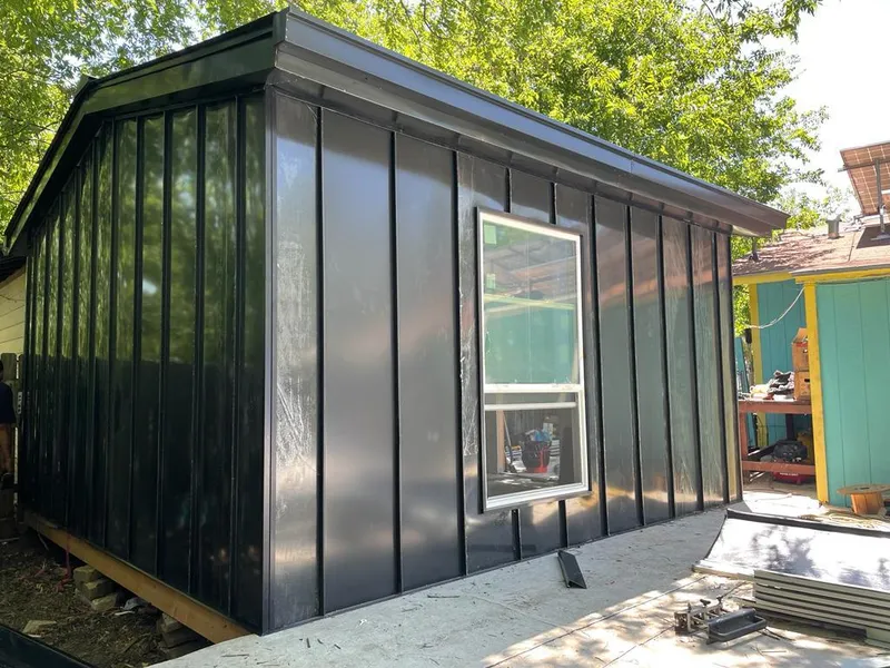 Black standing seam metal wall panels for Metal Roof Installation in Bonham