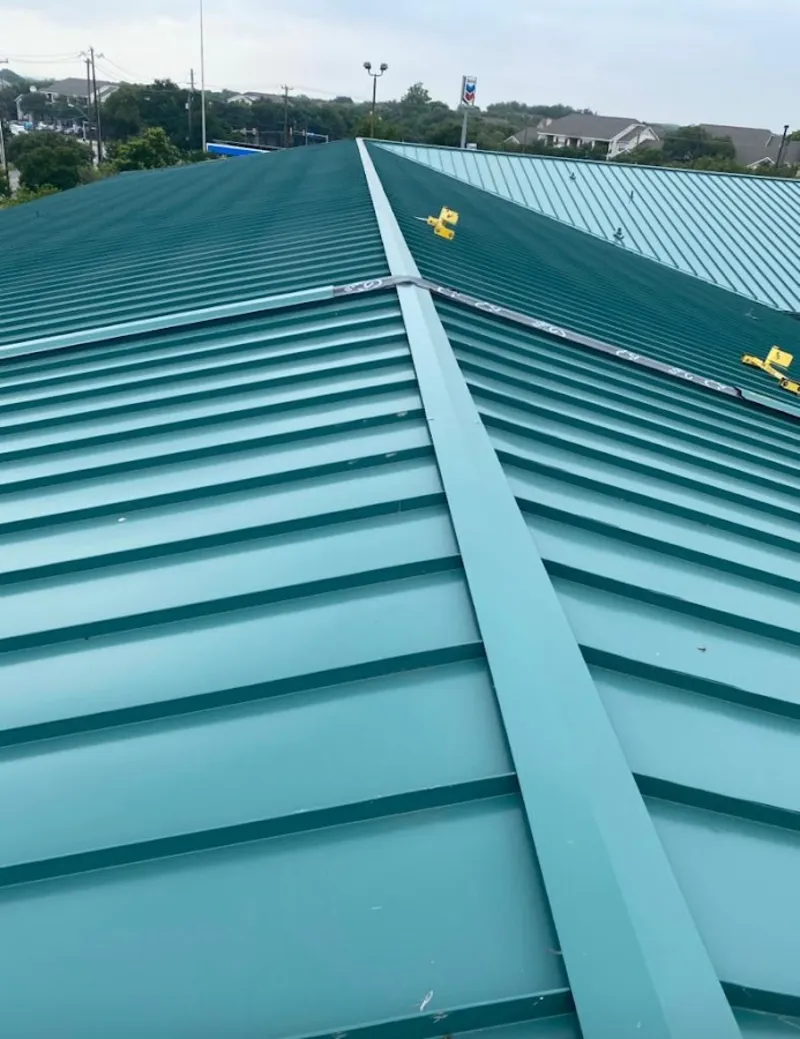 Green commercial metal roof ridge and valley for Metal Roof Repair in Bonham